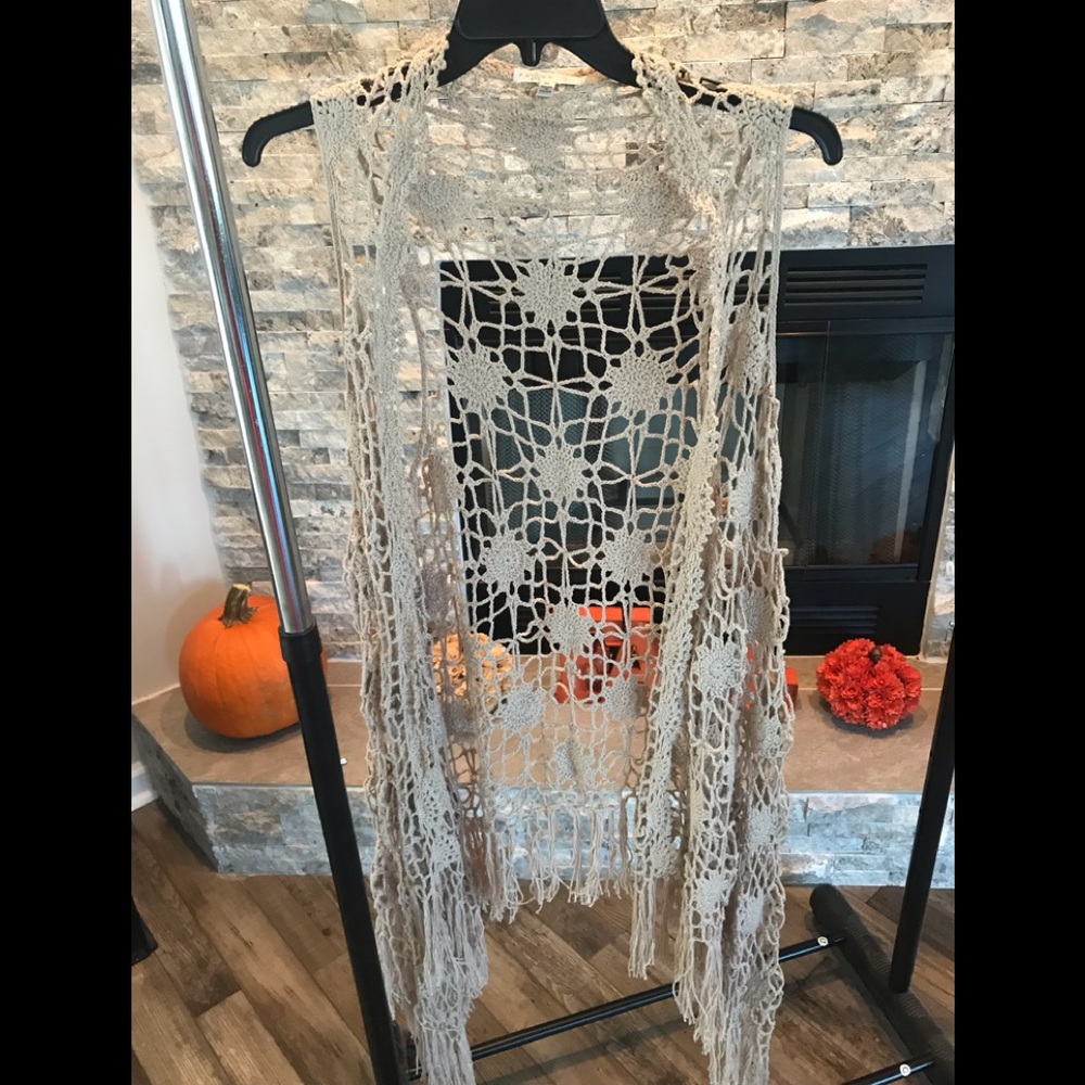Sleeveless crocheted long vest